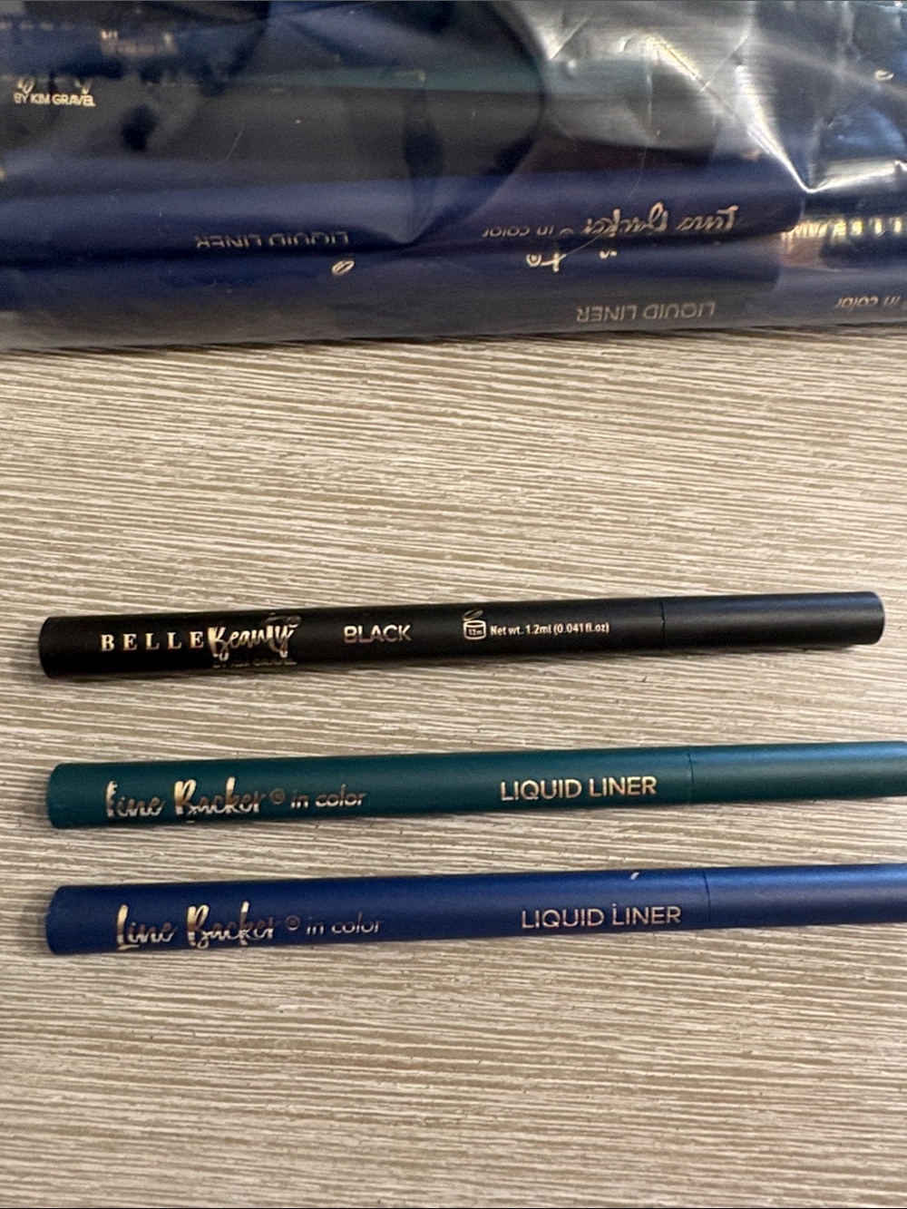 Belle by Kim Gravel Liquid Liners in Black, Teal & Navy